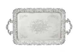 Plateau de service à anses en métal argenté, XXe s., la bordure ajourée et gravé au centre de fruits