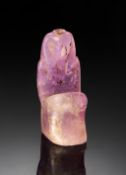 AN EGYPTIAN AMETHYST AMULET OF A SEATED PHARAOH PTOLEMAIC PERIOD, CIRCA 332-30 B.C.