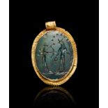 A ROMAN BLOODSTONE PENDANT SET IN A GOLD FRAME, 1ST-2ND CENTURY A.D.