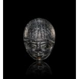 AN EGYPTIAN BLACK STONE HEART SCARAB LATE NEW KINGDOM, CIRCA 900 B.C.