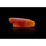 VERY RARE EGYPTIAN CARNELIAN CRICKET OR GRASSHOPPER AMULET, NEW KINGDOM, CIRCA: 18TH DYNASTY, 1390-1