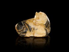 A WESTERN ASIATIC STONE BULL AMULET, CIRCA 7TH CENTURY B.C.