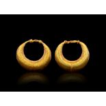 A PAIR OF ROMAN GOLD BABY EARRINGS, CIRCA 1ST-2ND CENTURY A.D.