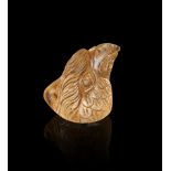 A ROMAN ROCK CRYSTAL EAGLE HEAD AMULET, CIRCA 1ST CENTURY A.D.