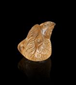 A ROMAN ROCK CRYSTAL EAGLE HEAD AMULET, CIRCA 1ST CENTURY A.D.