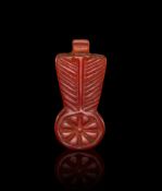 AN EGYPTIAN CARNELIAN AMULET NEW KINGDOM, DYNASTY XIX-XX, 1307-1070 B.C.