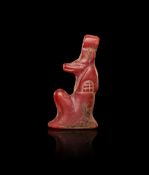 AN EGYPTIAN CARNELIAN ANUBIS AMULET NEW KINGDOM, DYNASTY XIX-XX, 1307-1070 B.C.