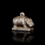 AN EGYPTIAN SILVER HIPPOPOTAMUS AMULET, LATE PERIOD, DYNASTY XXVI, 664-525 B.C.