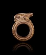 AN EGYPTIAN GRANDIORITE FROG RING, LATE PERIOD TO PTOLEMAIC PERIOD, 664-30 B.C.