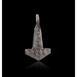A VIKING SILVER "MJOLNIR" PENDANT, CIRCA 9TH-10TH CENTURY A.D.