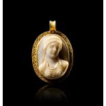 A ROMAN SARDONYX CAMEO OF A MAIDEN SET IN GOLD PENDANT WITH SURROUNDING PEARLS, CIRCA 1ST CENTURY