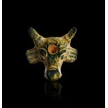 A NEAR EASTERN GREEN STONE BULL AMULET, EARLY DYNASTIC III, CIRCA 2500-2300 B.C.