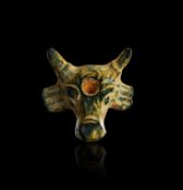 A NEAR EASTERN GREEN STONE BULL AMULET, EARLY DYNASTIC III, CIRCA 2500-2300 B.C.