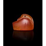 AN EGYPTIAN CARNELIAN "DUCK" AMULET NEW KINGDOM, DYNASTY XIX-XX, 1307-1070 B.C.