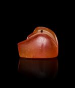 AN EGYPTIAN CARNELIAN "DUCK" AMULET NEW KINGDOM, DYNASTY XIX-XX, 1307-1070 B.C.