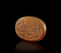 A CALLIGRAPHIC INSCRIBED AGATE AMULET, 19TH CENTURY, PERSIA