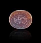 A CALLIGRAPHIC INSCRIBED AGATE AMULET, 19TH CENTURY, PERSIA