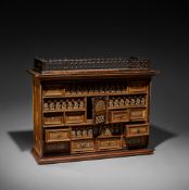 AN INDO PORTUGUESE ENGRAVED BONE MARQUETRY WALNUT CABINET, FIRST HALF 17TH CENTURY