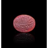 A CALLIGRAPHIC INSCRIBED AGATE AMULET, 19TH CENTURY, PERSIA