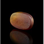A CALLIGRAPHIC INSCRIBED AGATE AMULET, 19TH CENTURY, PERSIA