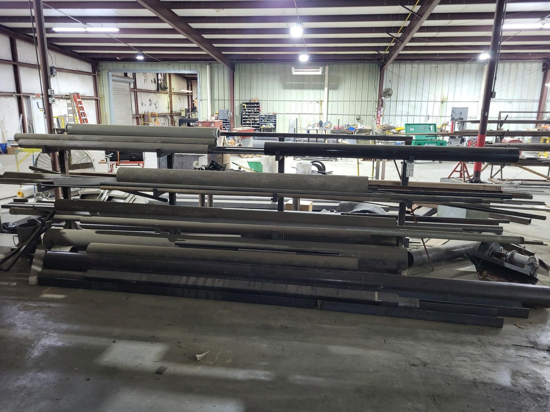 CANTILEVER RACK AND DUMP HOPPER FILLED WITH ASSORTED BAR STOCK ...