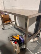 STAINESS STEEL TABLE ,48"W X 24"D X 30" HIGH ON CASTERS