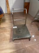 STAINLESS STEEL DOLLY, 25"W X 31" LONG PLATFORM WITH HANDLE. ON WHEELS.