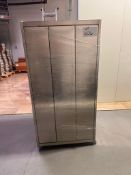 STAINLESS STEEL LOCKER, 3 COMPARTMENT OVERALL DIMENSIONS ARE 35" W X 24"D X 70"HIGH. ON WHEELS.