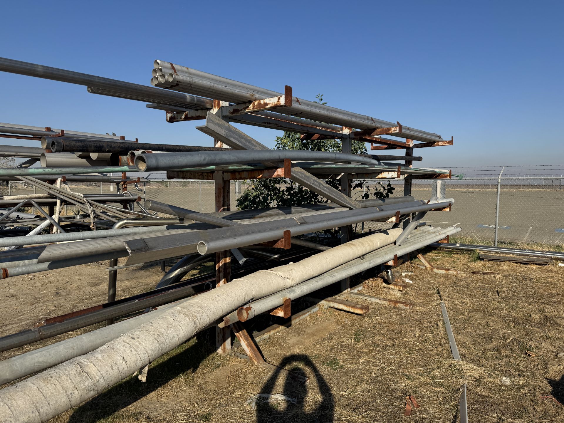 [Lot] of (6) assorted pipe racks located adjacent to the boneyard area ...