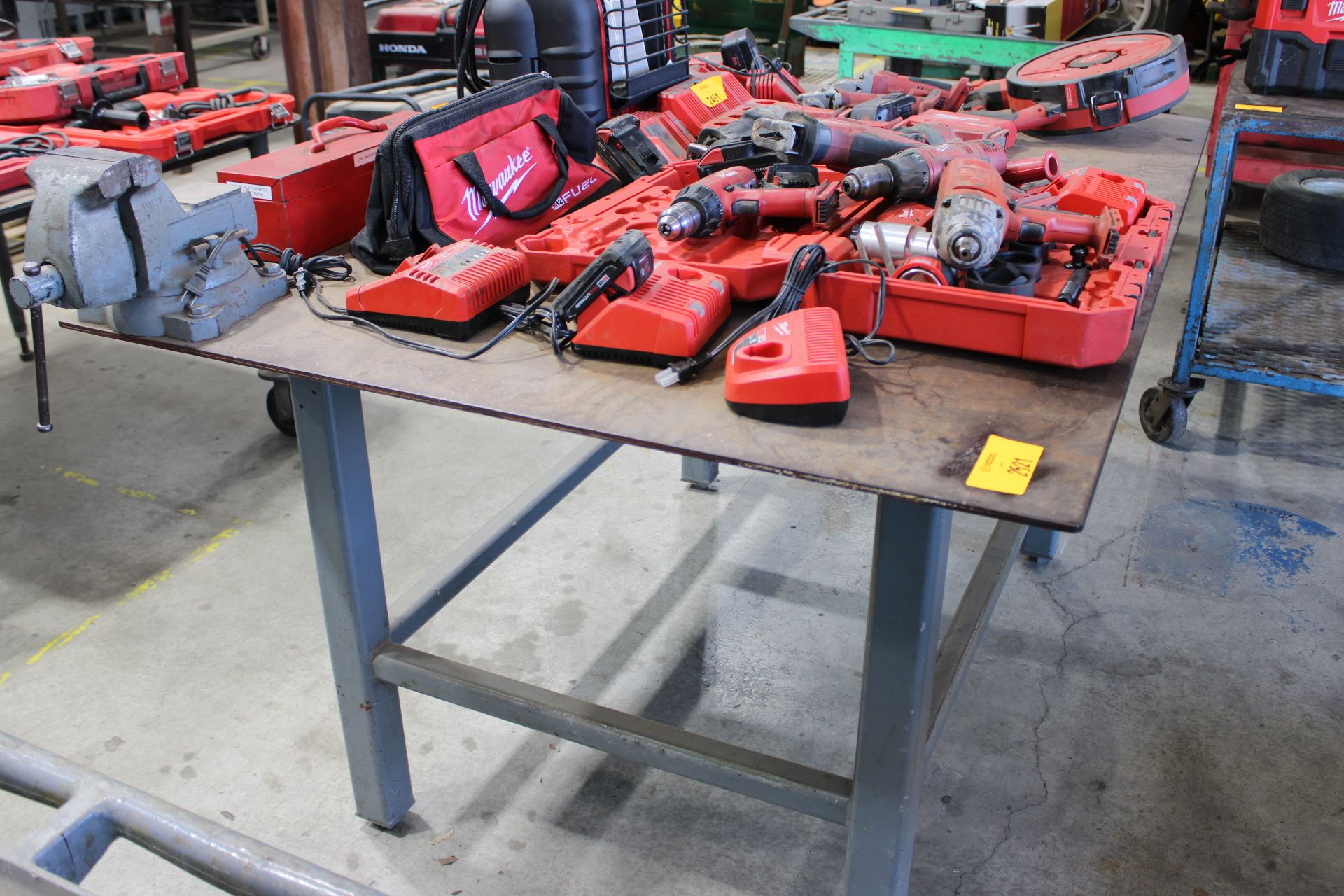 [Lot] of (3) steel shop tables with vises, measuring 52