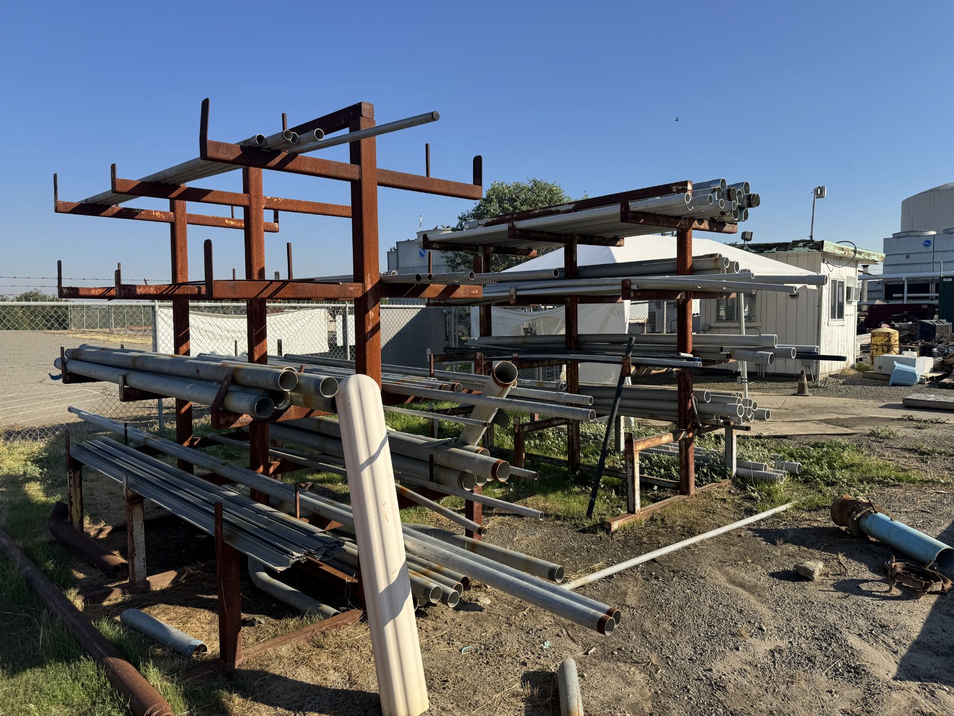 [Lot] of (6) assorted pipe racks located adjacent to the boneyard area ...