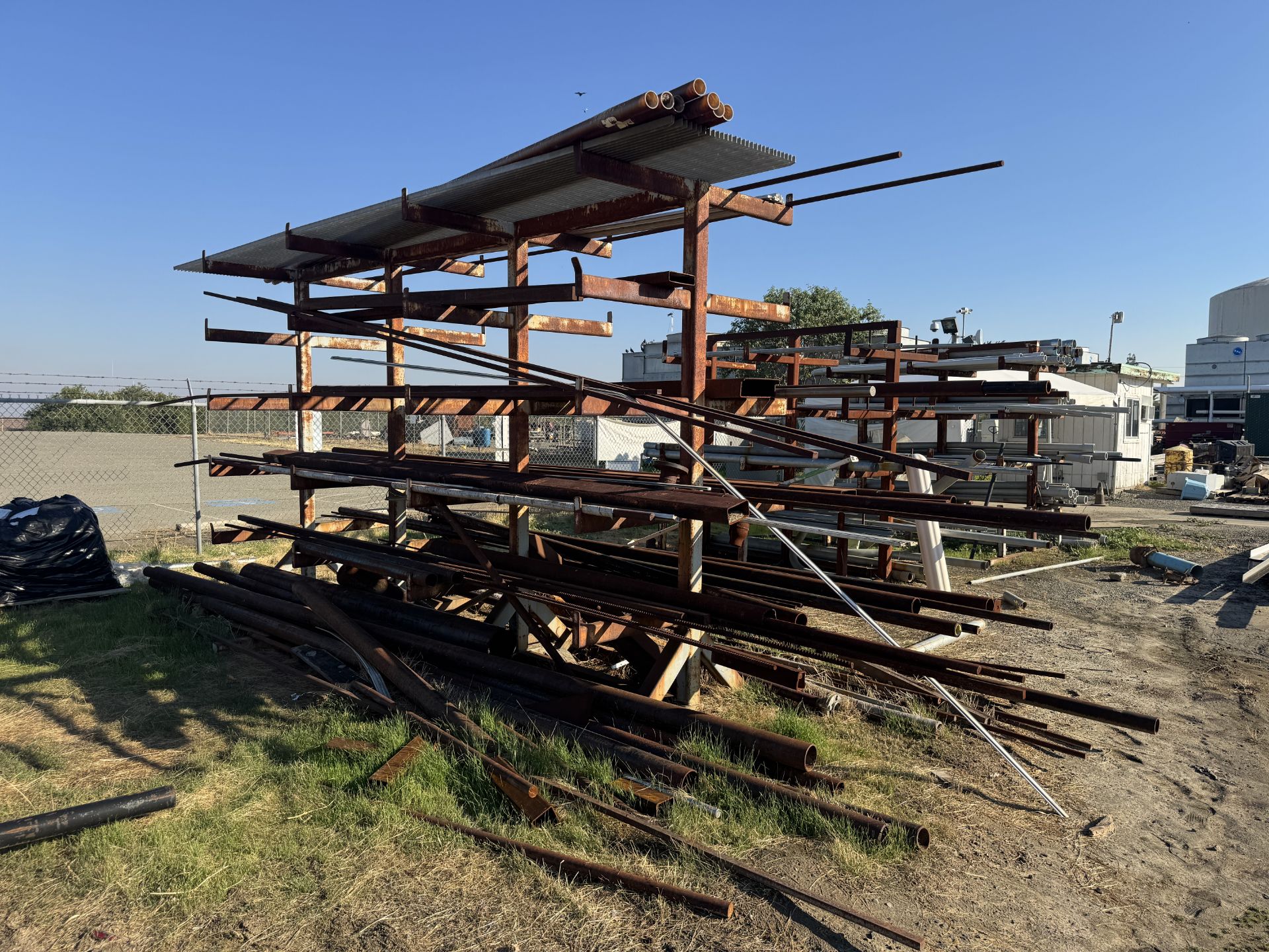 [Lot] of (6) assorted pipe racks located adjacent to the boneyard area ...