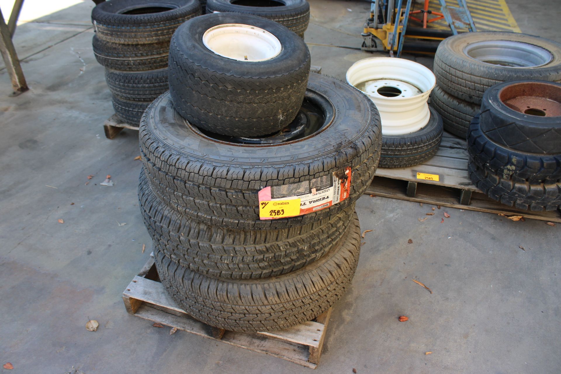 [Lot] of assorted light truck tires and wheels on (2) pallets [Mechanic ...