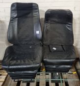 2x Black half leather captains chairs on pedestal