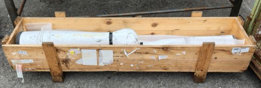 Manipulator arm extension in wooden crate