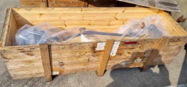 Land Rover RWMIK+ rear axle assembly with brake discs, pads and calipers in wooden storage crate