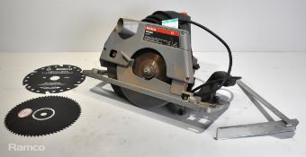 Bosch PKS 66 1200W portable circular saw with spare cutting blades and user manual