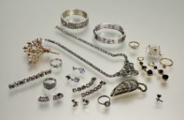 A collection of white and yellow metal paste set jewellery to include an expanding bracelet, a