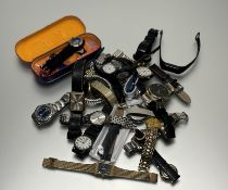A collection of twenty four various quartz wrist watches to include a John Adams stainless steel