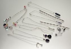 A collection of silver and white metal jewellery to include a large oval faceted cut paste ring L, a