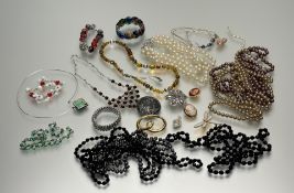 A collection of costume jewellery to include a Murano-style milifiori expanding bracelet, a paste