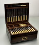 An oak canteen containing a suite of old English pattern epns flatware for twelve place settings