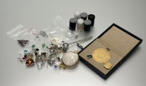 A King Saud University gilt medallion plaque in a presentation box with pin, an eastern white