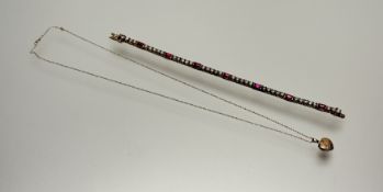 A 9ct fine trace link chain necklace with ring fastening and 9ct heart-shaped double sided locket: