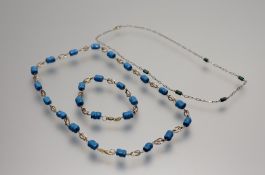 A 18ct gold chain spiral link necklace set ninteen turquoise shapped beads spacers with lobster claw