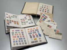 A set of three albums containing a collection of the Netherlands (Holland) Stamps, the older album