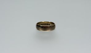 A 9ct gold wedding band Q 3.71g