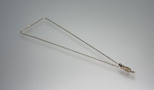 A 9ct gold Welsh spoon pendant on bar link 9ct gold chain necklace with ring fastening: l. x 28cm