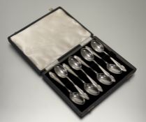 A set of eight Sheffield silver tea spoons in original black velvet-lined case: l. x 13cm