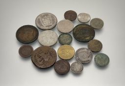 A collection of British and foreign copper, brass and white metal coins to include an Austro-